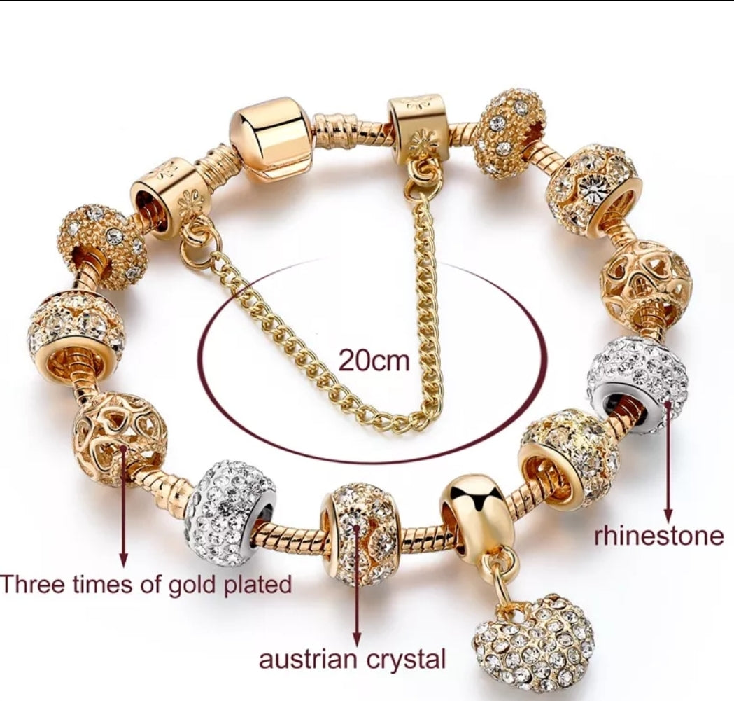 Gold Charm Bracelet with Diamates Ball 